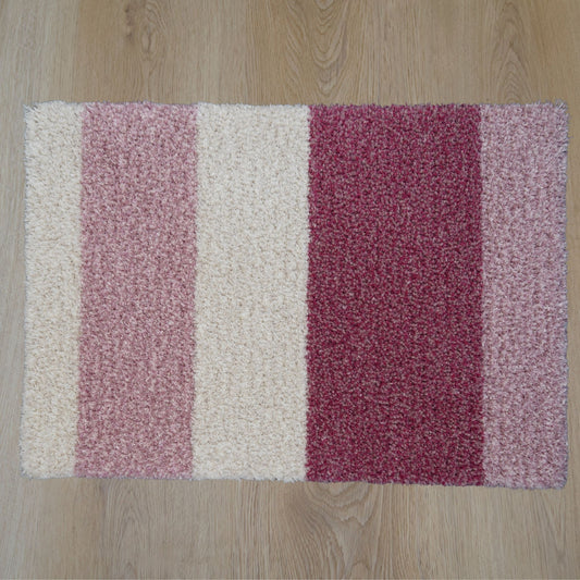 Blush rechthoekig vloerkleed in roze tinten, gemaakt van gerecyclede wol – Studio Sisté – sfeerfoto